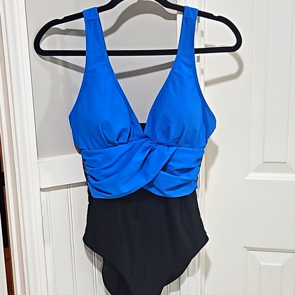 Women's size 6 medium one piece Swimsuit, blue and black v neck line